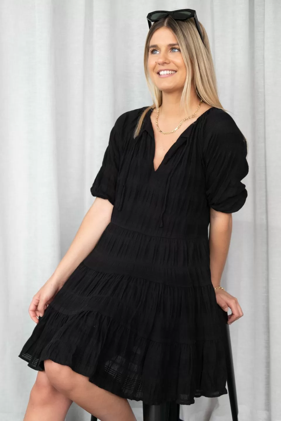 Playful Black Shirred Cotton SS V Neck Tiered Mini Dress