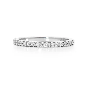 Rounded band shared claw set diamond ring